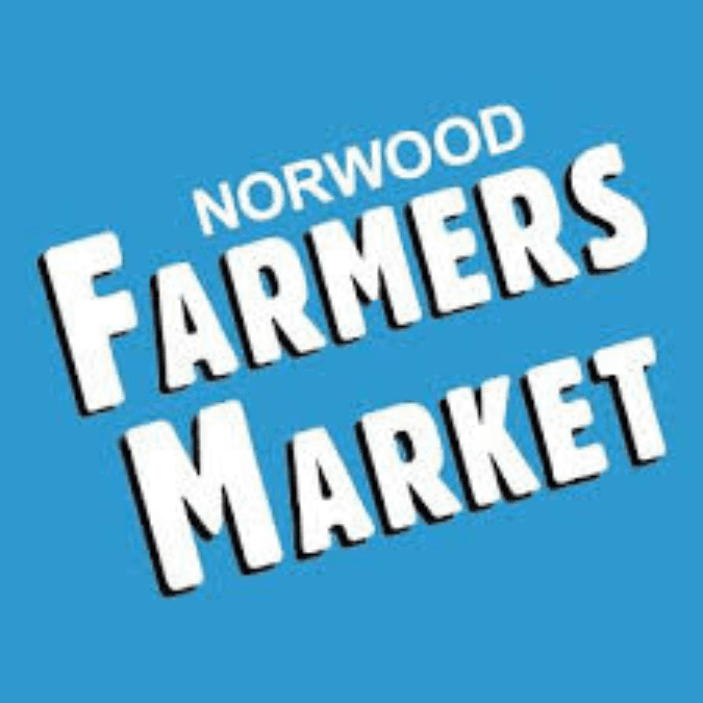 Logo for Norwood Farmers Market in bold white text on blue.