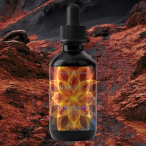 A dropper bottle with a glowing mandala design on a rocky, volcanic background.